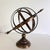 Vintage brass armillary sphere with arrow, nautical maritime astrolabe globe. Great for desk decor. Heavy, beautiful...
