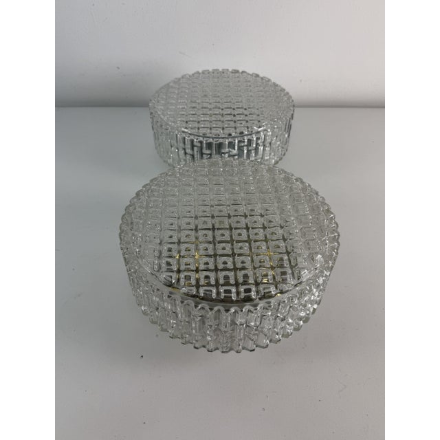 Set of 2 circular ceiling/wall lamps in textured glass, designed by Rupert Nikoll, 1960s Glass intact, metal frame, E27...