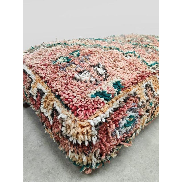 This unique seat cushion from Morocco is a beautiful example of artisanal craftsmanship. Each piece is carefully handmade...