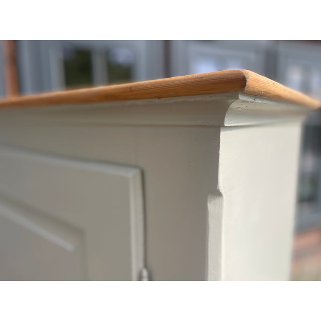 This charming antique cabinet has been repainted by us; the interior has been completely sanded and oiled. Width: 92 cm...