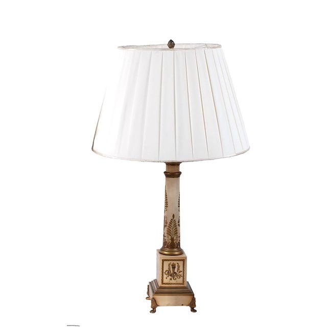 This is a super chic pair of Column Empire-Style Painted Tole Lamps. These tall Column lamps date to c. 1950-1960 and are...
