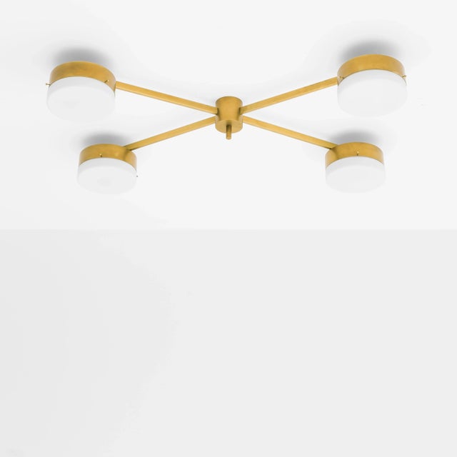 The Celeste Aurora Wall / Ceiling Light brings elegance to midcentury design through the inspiration of Italian design -...