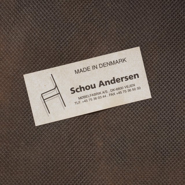 A really nice pair of vintage Danish dining chairs by Schou Andersen, made in Denmark from solid teak. They have that...