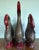 Three beautifully carved Asian wood ducks with mirror inlay and gold accents. Two of the ducks are 20" tall and the...
