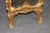 This magnificent pair of monumental Rococo style giltwood mirrors embodies the elegance, movement, and exuberance of...