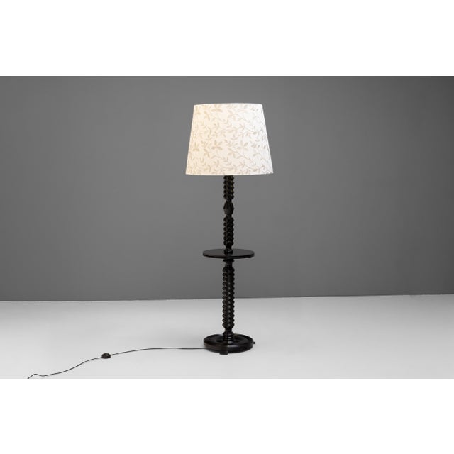 Fantastic ebonised floor lamp in a brutalist design with a central table. Re-wired and tested. New custom made shade....