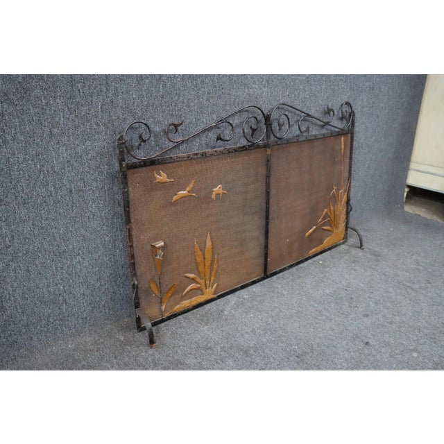 Victorian Arts & Crafts fireplace screen, Circa late 19th C. Copper and iron with duck and cat tails