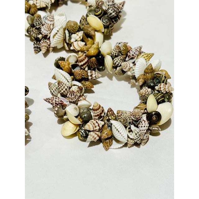 Sweet set of sea shell napkin rings - perfect for a quick, casual coastal table setting!