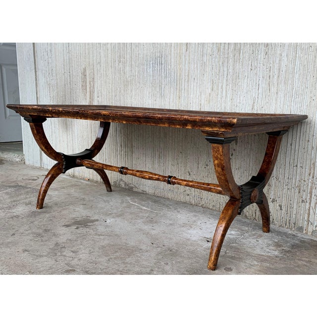 Eglomisé Side tables in the Hollywood Regency style with ebonized details Set of two square coffee tables and one...