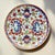 This Japanese Imari porcelain wall plate is an example of classic Arita ware, celebrated for its rich palette of cobalt...