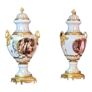 The Romantic Gilded Muse Set of 2 – French-Inspired Lidded Porcelain Vase With Hand-Painted Scenes, Gold Leaf & Bronze Ormolu (Sold Individually) For Sale