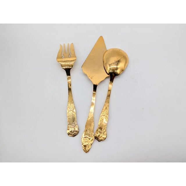 Set of 3 serving utensils in gold tone color by William Adams, Italy. Gorgeous serving utensil set for dinners. Cake/pie...