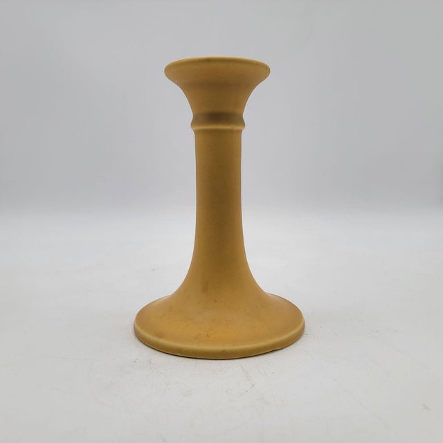 These vintage Rookwood Pottery candle holders showcase a timeless matte yellow glaze. A charming addition to antique...