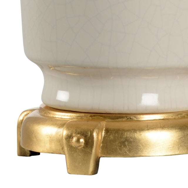 Complement your transitional or contemporary decor with this versatile 32" accent lamp. A warm antique gold leaf finished...