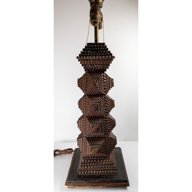 We are selling this great American tramp art folk art table lamp. This lamp has great scale and simple tramp art design...