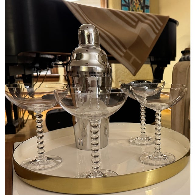 Pop the bubbly! Presenting this fabulous set of four vintage Mikasa “Pearls” crystal champagne coupes, featuring...