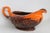 This beautiful footed Gravy Boat and Saucer is made of Ceramic. It has a sticker marked Roy Craft Montreal Canada. The...