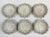 This set of 6 shell shaped pottery shallow bowls, glazed in a palette of off-white, light gray and beige, are perfect for...
