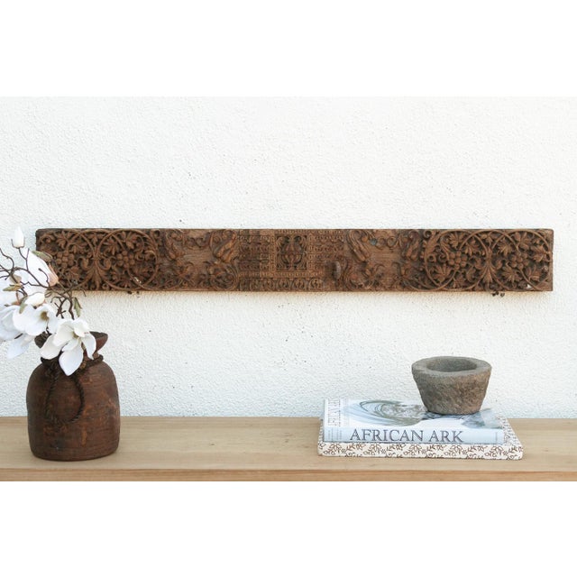 Uncover a piece of history with this authentic architectural carving, salvaged from the structures of 19th-century India....