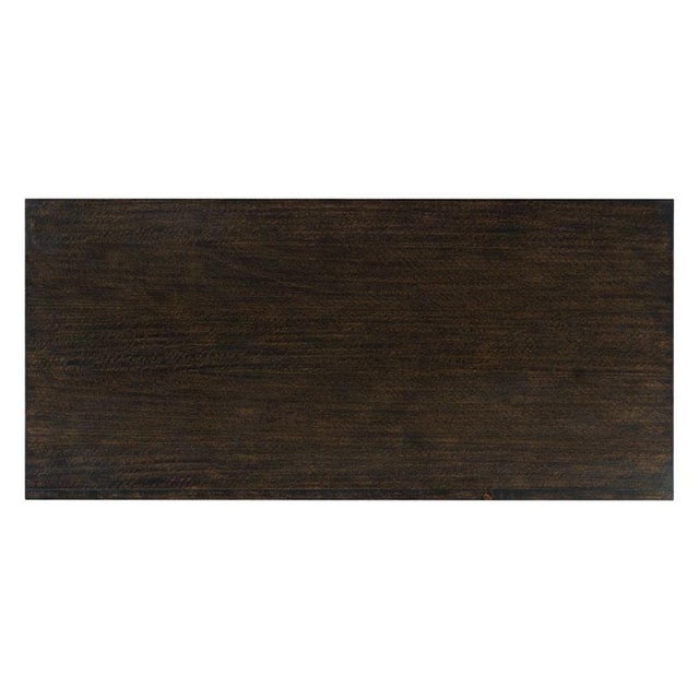 A handsome storage chest with six individual drawers are mounted with satin brass ring pulls elevated on tapering legs....