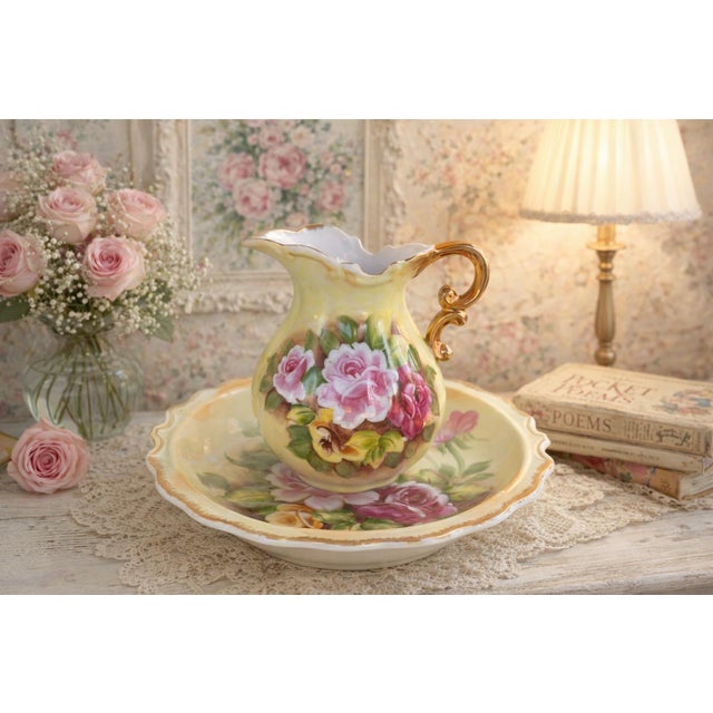 This charming vintage porcelain pitcher and basin set was made in Japan and features hand-painted roses in soft pink,...
