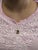 An exquisite piece of fine jewelry, this pendant showcases a vivid 5.62ct cushion-shaped chrome tourmaline (12x9mm),...