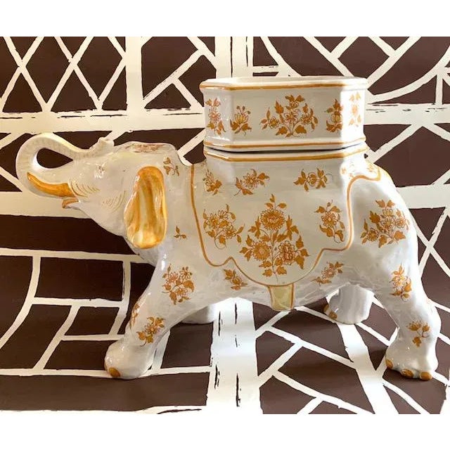 Tiffany & Co large faience elephant jardiniere. Features a top decorative vessel area for candy, potted plants. The body...