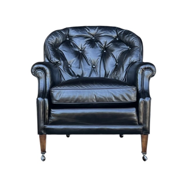 This functional 1960s English-inspired club chair beautifully captures the timeless sophistication of classic library...