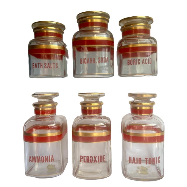 Rare style of antique glass apothecary jars in a set of six includes: Peroxide, Hair Tonic, Ammonia, Bath Salts, Boric...