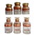 Rare style of antique glass apothecary jars in a set of six includes: Peroxide, Hair Tonic, Ammonia, Bath Salts, Boric...