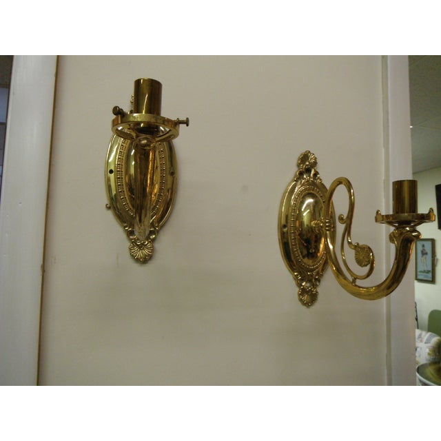 This vintage pair of brass sconces will add a nice accent to doorway or highlighting fireplace, bookshelf or dining area....