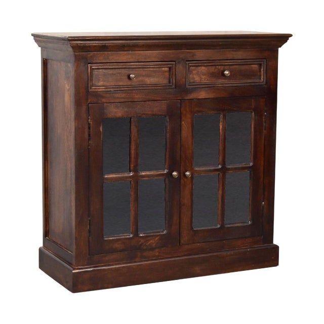 Elegant and functional, this Solid Wood Storage with Brass Knobs is crafted from 100% solid mango wood with glass-paneled...