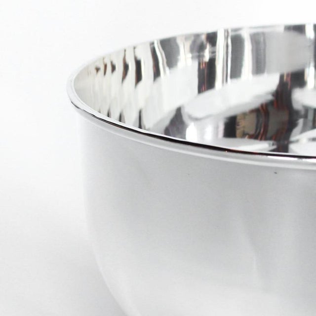 A large, silver plated champagne bowl of recent manufacture with raised detail to side. Dimensions: H 25cm, Diameter 37cm...