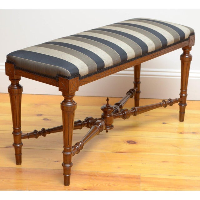 Very attractive Victorian duet stool or hall seat in walnut, having newly recovered seat above decorative carved frieze,...