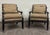 This is a stylish pair of vintage C.R. Laine French Louis XVI style designer accent chairs featuring richly carved dark...
