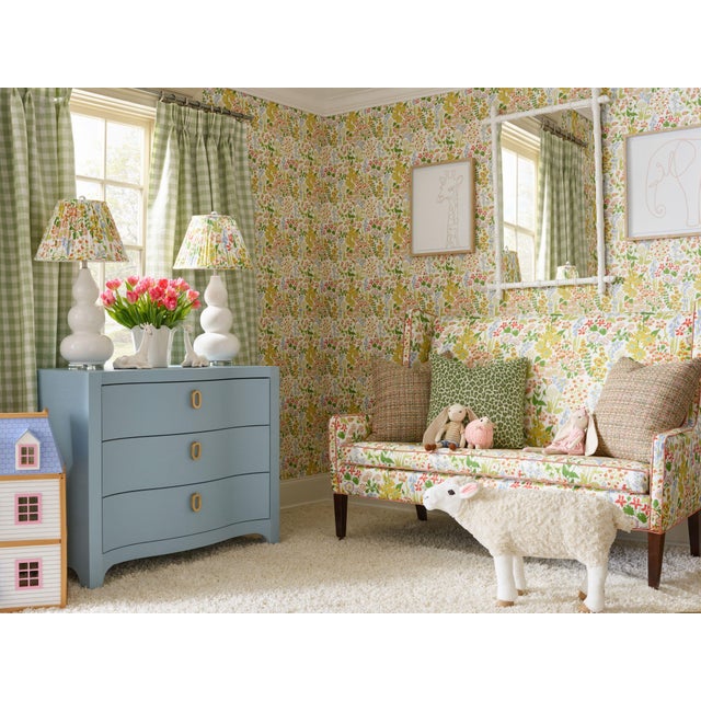 A charming English garden comes to life in Nymph Floral, a multi-color digital print wallcovering that has been slightly...