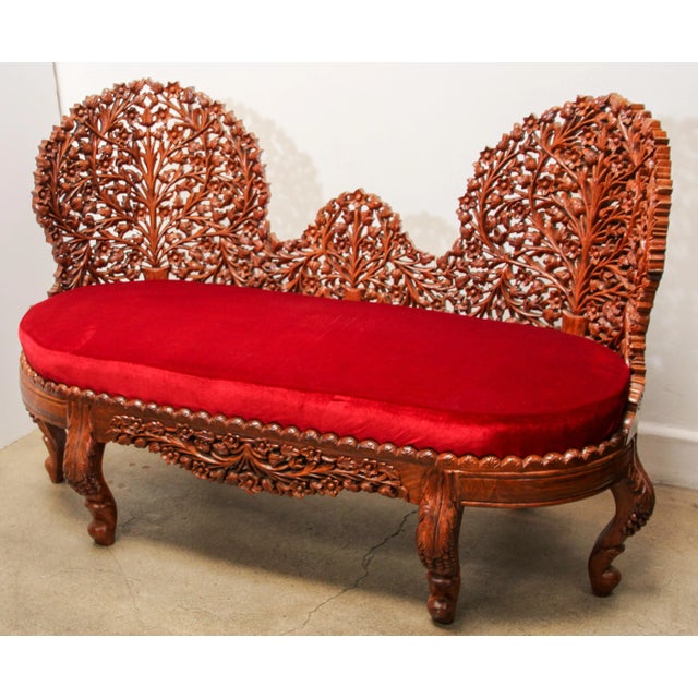 Anglo-Raj contemporary settee with foliate open carved wood back and carved legs. Intricately detailed. From Rajasthan,...