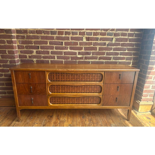 Item: Nine Drawer Low Dresser with Mirror Manufacturer: The Lane Company Designer: Warren Church Period: 1960s Place of...