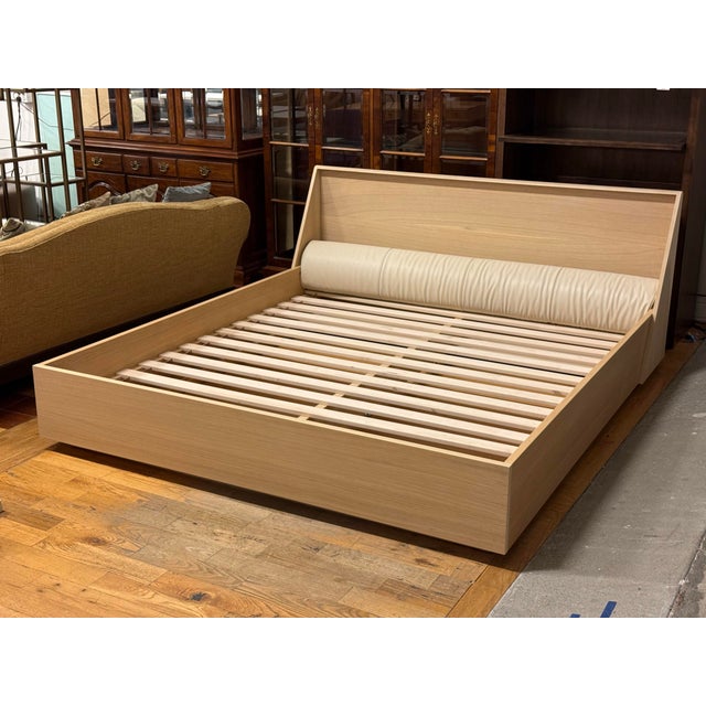 Design Plus Gallery presents a California King Platform Bedframe. Rectilinear in form and rigid in materiality, the bed is...