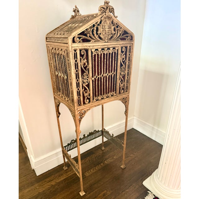A rare and exceptionally decorative antique gilt bronze mailbox attributed to Oscar Bach, celebrated for his richly...