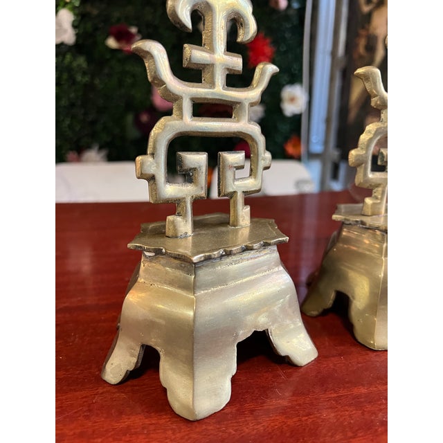 Up for consideration is a beautiful vintage pair of solid brass heavy chinoiserie candle holders. These would look lovely...