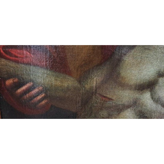 Large oil painting on canvas depicting the deposition of Christ. The figure of Jesus, rendered with the gray color of...