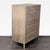 This Arhaus dresser features a light wood finish and a clean, modern look. It has six spacious drawers with metal knobs,...