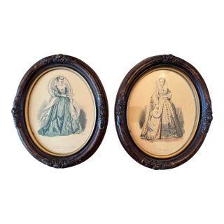 Pair of Vintage Framed French Historical Costume Prints After Hippolyte Paquet Carved Oval Wood Frames European Fashion Illustrations For Sale