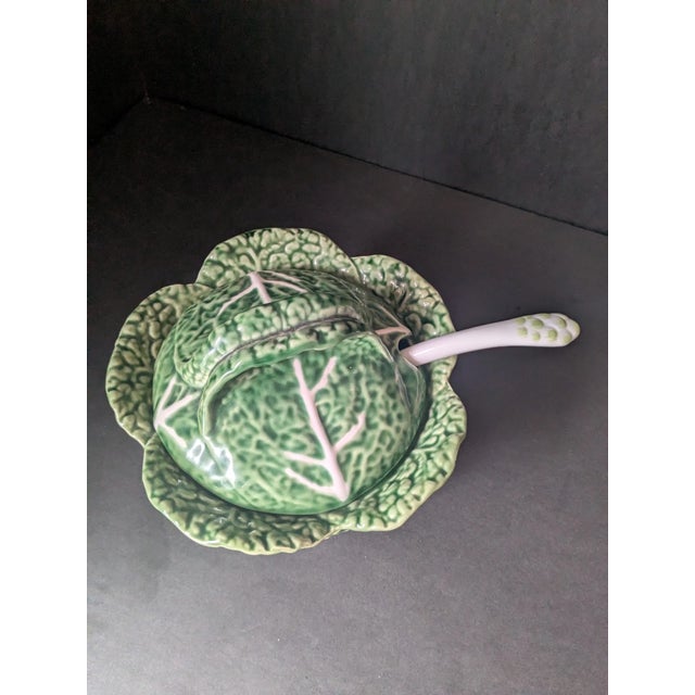 Bring classic Portuguese craftsmanship and whimsical botanical charm to your table with this **Vintage Bordallo Pinheiro...