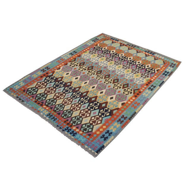 "Add a touch of elegance to your home with this casual chic hand woven Tribal Kilim wool rug. Constructed on a loom by...