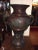 Large Meiji period bronze twin handled urn with decoration. Decoration consists of raised birds, branches with cherry...