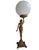 An Art Deco Banksway figural lamp of lady holding a large globe above her head. This lamp is in very good condition and...