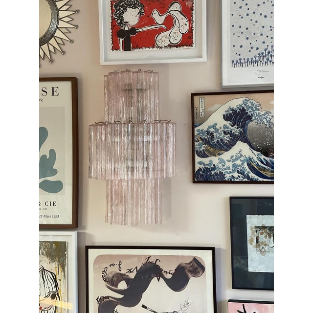 Murano wall lamp in clear glass consisting of eighteen tubular prisms with finishes and fittings in chrome. Glass from the...