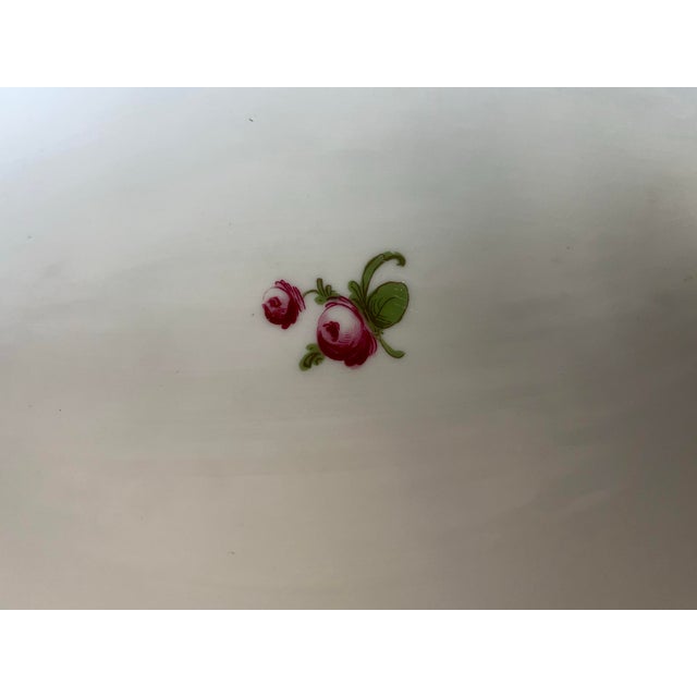 A beautifully aged vintage hand painted porcelain dresser box marked FBS Germany.